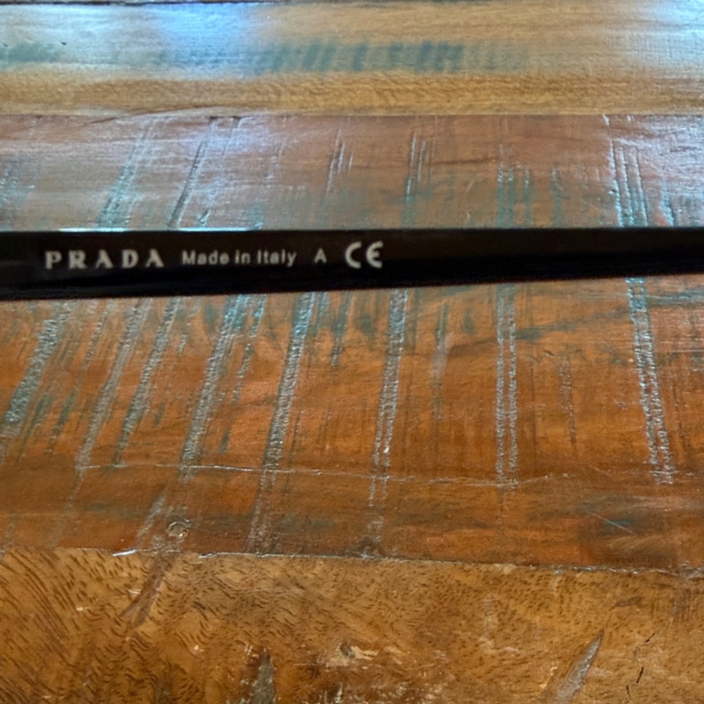Prada Elegant Black Cat-Eye Women’s Sunglasses - Picture 5 of 7